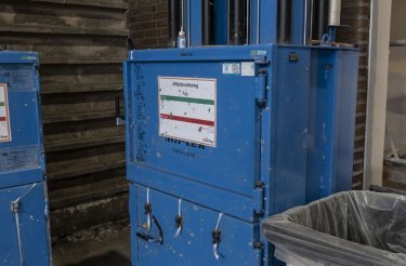 old version of a blue 2306 baler